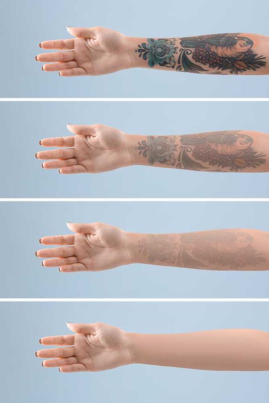 Female arm with tattoo on color background