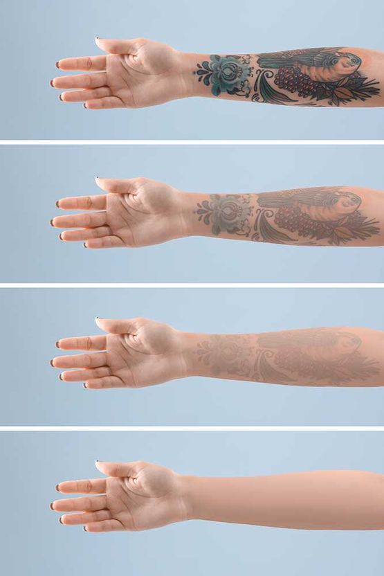 Female arm with tattoo on color background